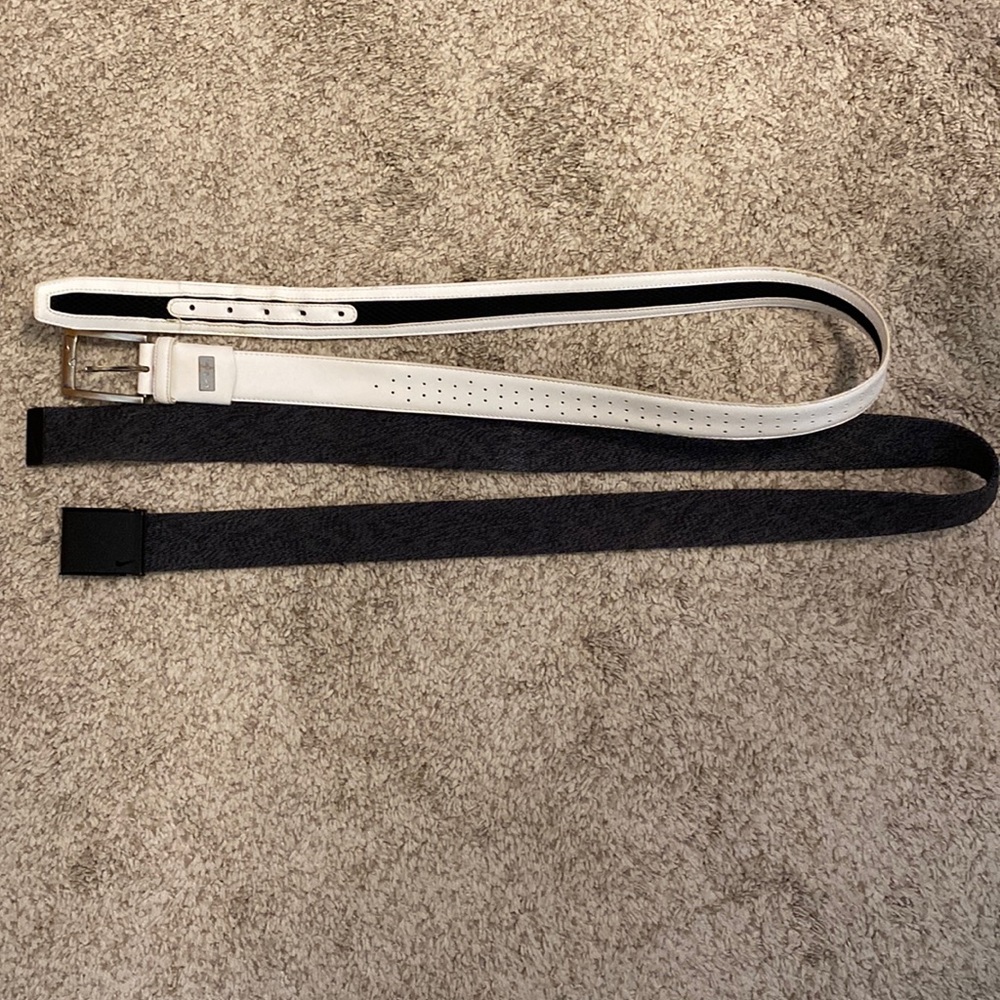 Two Nike golf belts